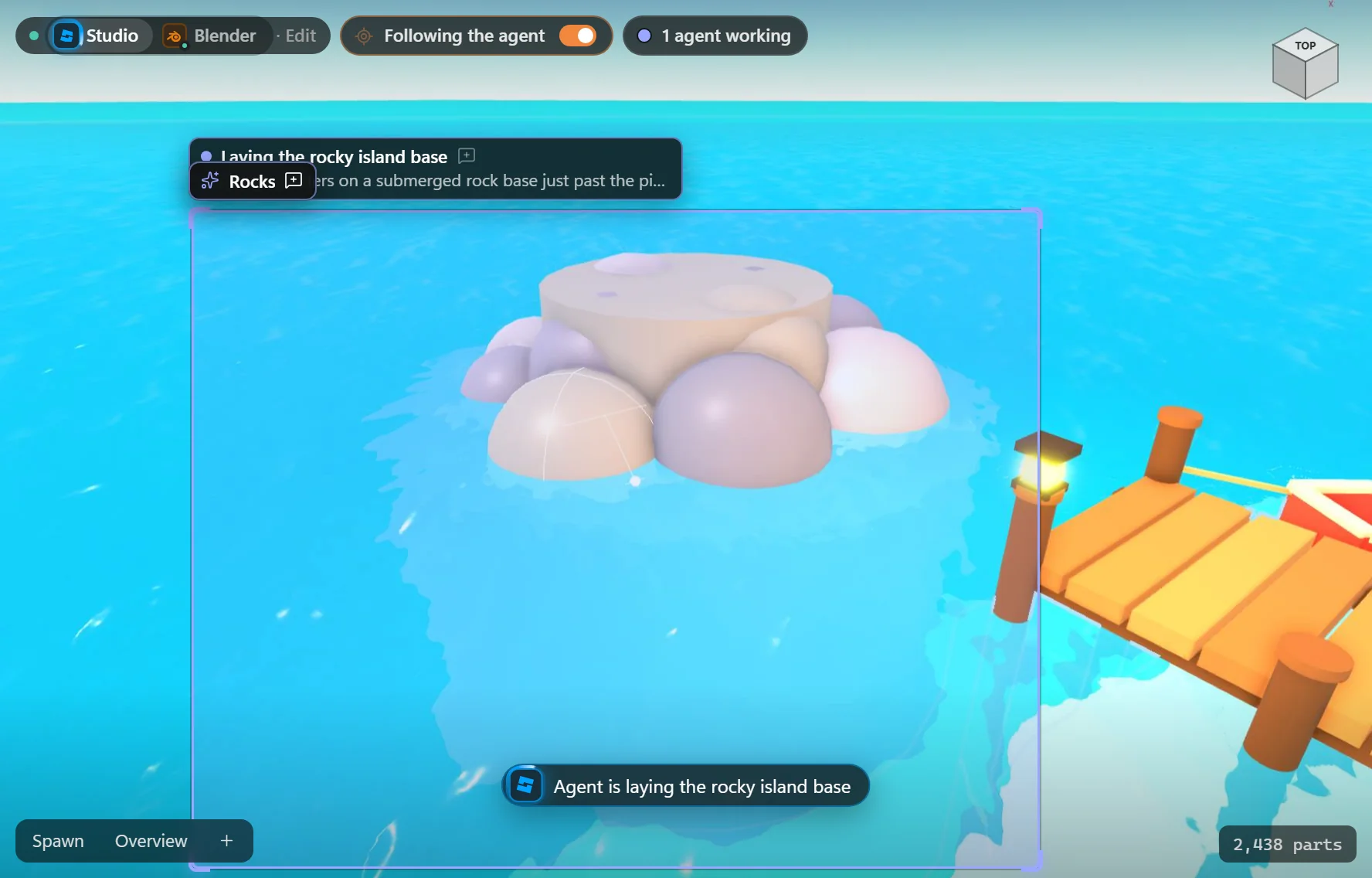 A small rock island goes into the water